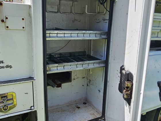 Vertical utility compartment