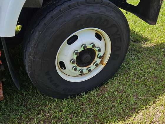 Opposite front tire and wheel