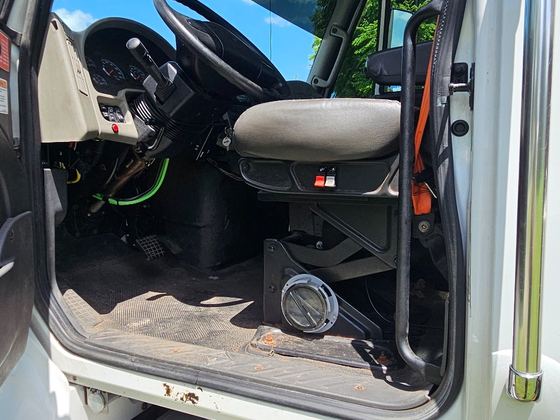 Driver seat, controls, and cab entry