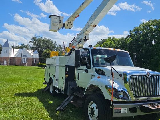 Boom deployed, front three-quarter view